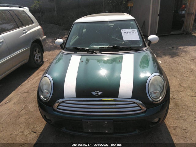 2010 MINI COOPER HARDTOP VIN: WMWMF3C57ATZ26627