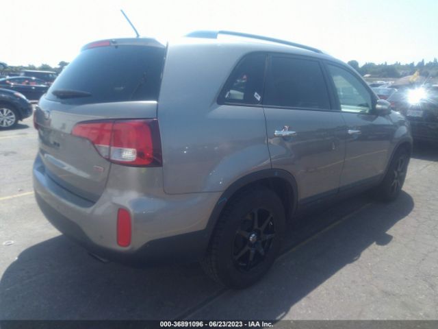 5XYKTCA65EG475908 KIA SORENTO LX