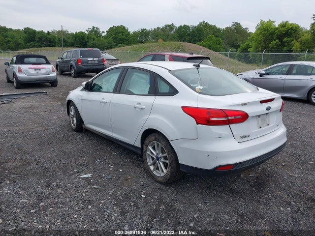 2016 FORD FOCUS SE VIN: 1FADP3F24GL328270