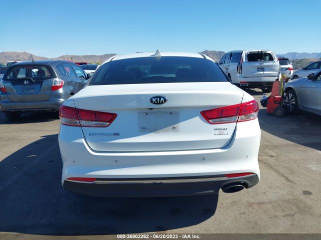 5XXGT4L33JG221000 KIA Optima Lx