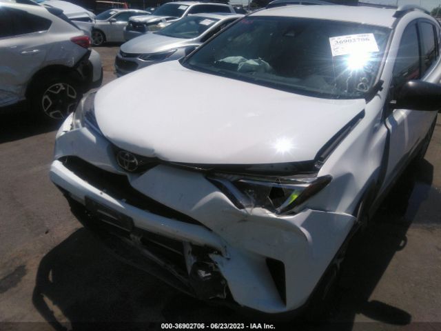 JTMZFREV9JJ174532 Toyota RAV4 LE