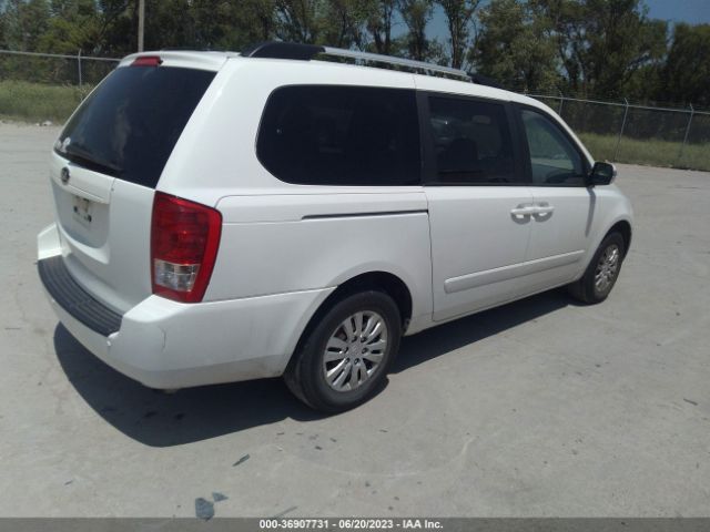 KNDMG4C76E6538669 KIA SEDONA LX