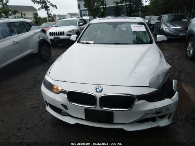 WBA3C3C55EPV90673 BMW 3 Series 320i Xdrive