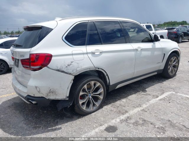 5UXKR2C54F0H39898 BMW X5 Sdrive35i