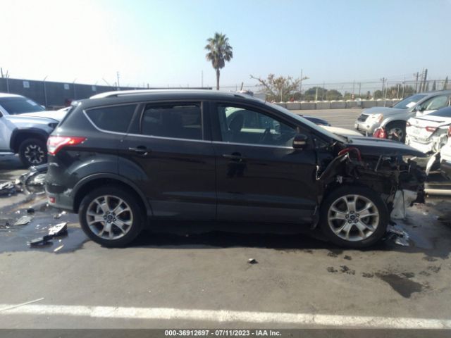 1FMCU0J99EUD80675 Ford Escape Titanium