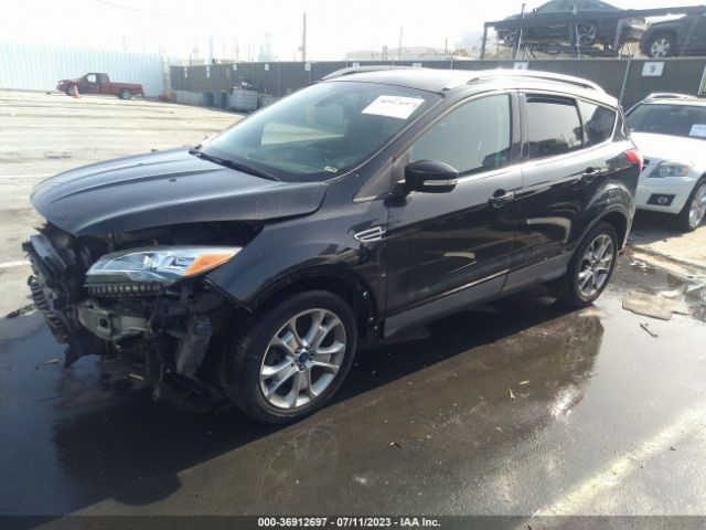 1FMCU0J99EUD80675 Ford Escape Titanium