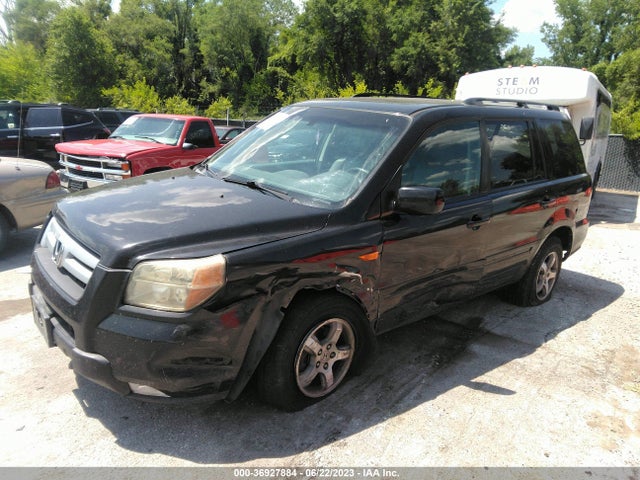2007 HONDA PILOT EX-L VIN: 5FNYF18697B017228
