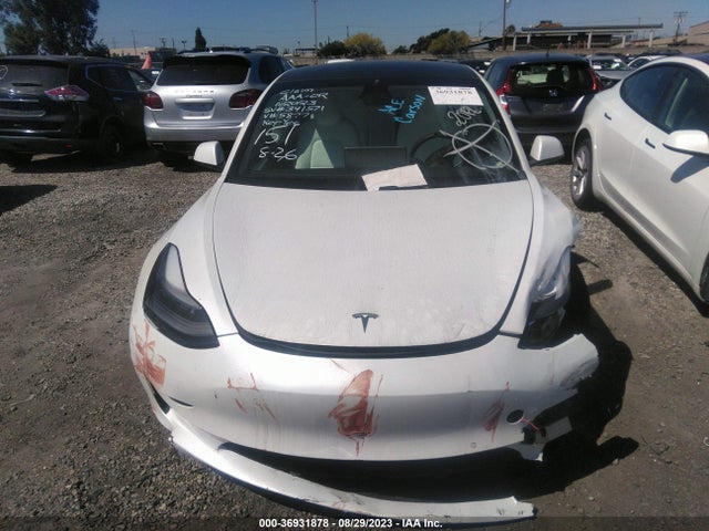 Tesla MODEL 3 2022 5YJ3E1EA0NF355877 Image 4
