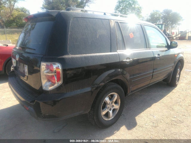 2006 HONDA PILOT EX-L VIN: 5FNYF28506B019882