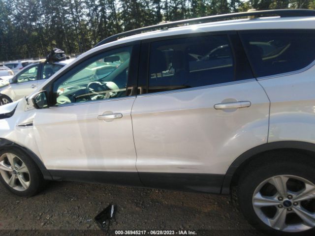 1FMCU9GX7EUC01785 Ford ESCAPE SE