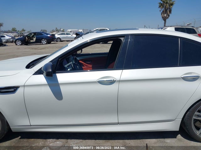 2015 BMW M5, VIN: WBSFV9C51FD594857