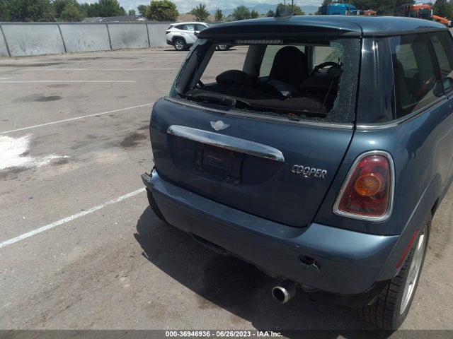 2010 MINI COOPER HARDTOP VIN: WMWMF3C55ATZ62915