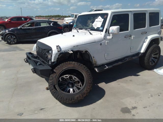 1C4BJWEGXEL262953 Jeep Wrangler Unlimited Sahara