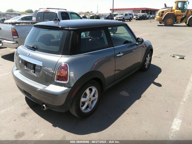 2010 MINI COOPER HARDTOP VIN: WMWMF3C55ATU77576