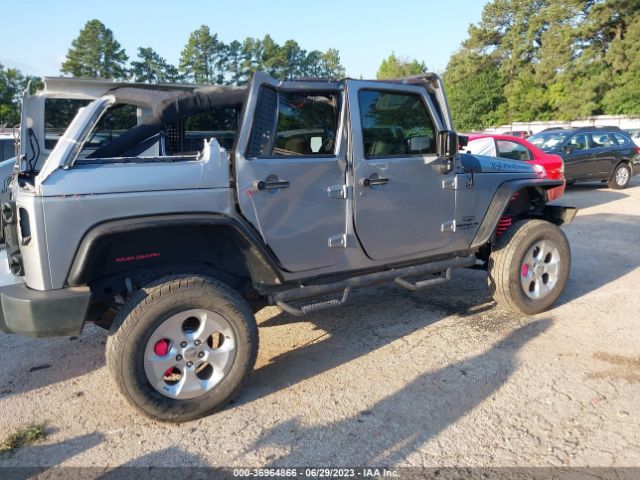 1C4BJWDG9EL312355 Jeep Wrangler Unlimited Sport