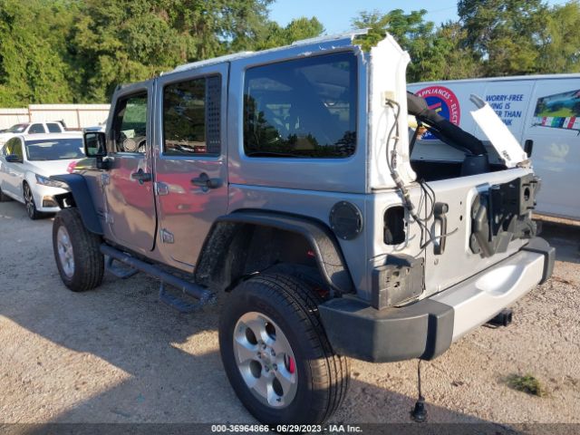 1C4BJWDG9EL312355 Jeep Wrangler Unlimited Sport