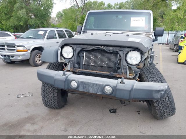 1C4HJWDG4EL200007 Jeep Wrangler Unlimited Sport