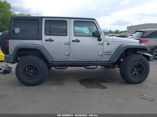 1C4HJWDG4EL200007 Jeep Wrangler Unlimited Sport