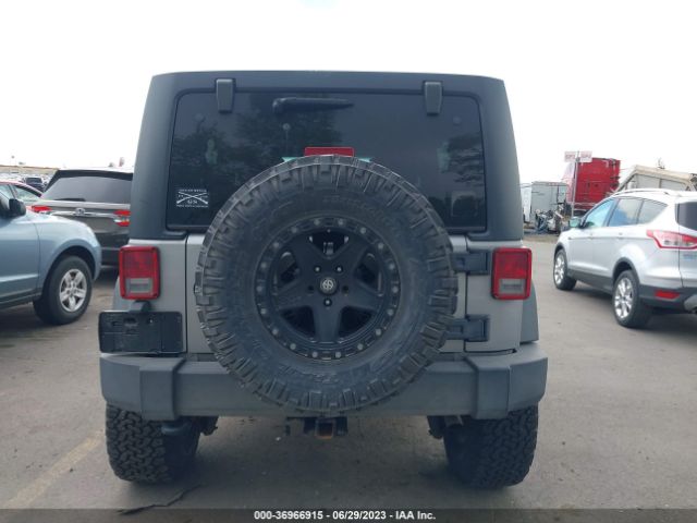 1C4HJWDG4EL200007 Jeep Wrangler Unlimited Sport