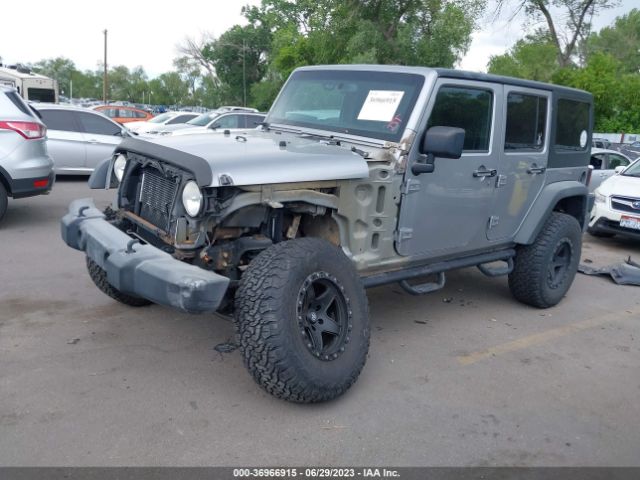 1C4HJWDG4EL200007 Jeep Wrangler Unlimited Sport