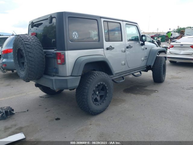 1C4HJWDG4EL200007 Jeep Wrangler Unlimited Sport
