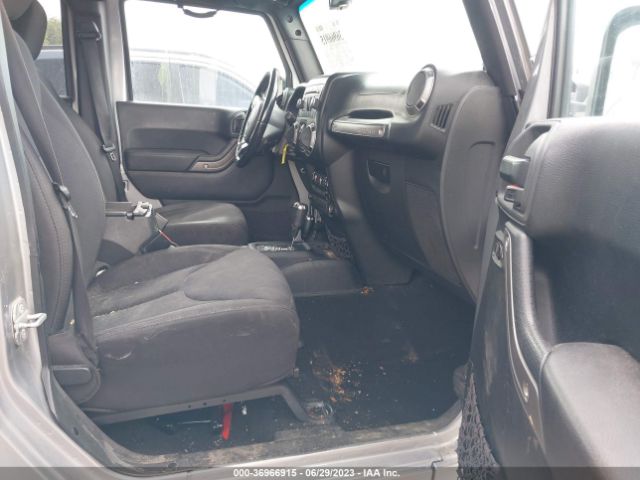 1C4HJWDG4EL200007 Jeep Wrangler Unlimited Sport