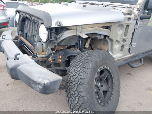 1C4HJWDG4EL200007 Jeep Wrangler Unlimited Sport