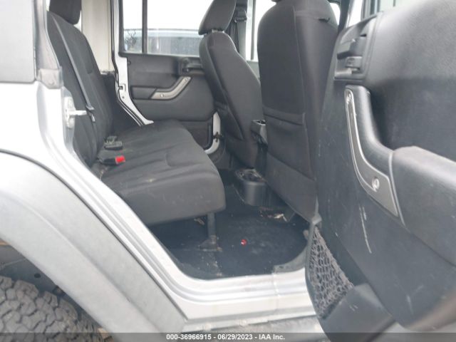 1C4HJWDG4EL200007 Jeep Wrangler Unlimited Sport