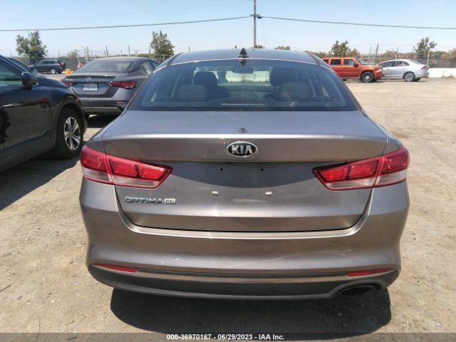 5XXGT4L38GG115876 KIA Optima Lx