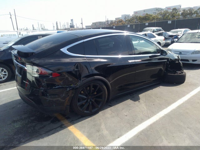 2021 Tesla Model X, VIN: 5YJXCDE27MF321497