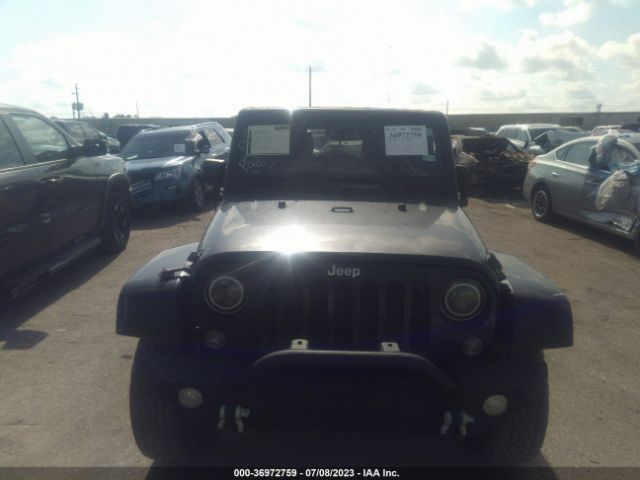 1C4BJWEG3EL257335 Jeep Wrangler Unlimited Sahara