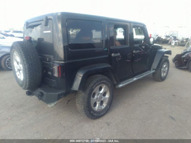 1C4BJWEG3EL257335 Jeep Wrangler Unlimited Sahara