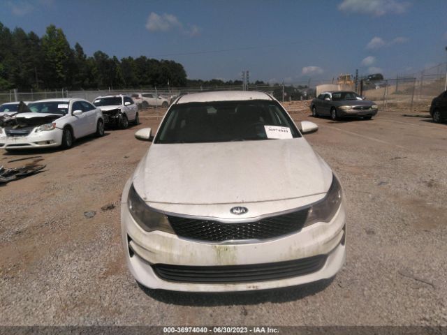 5XXGT4L35GG001477 KIA Optima Lx