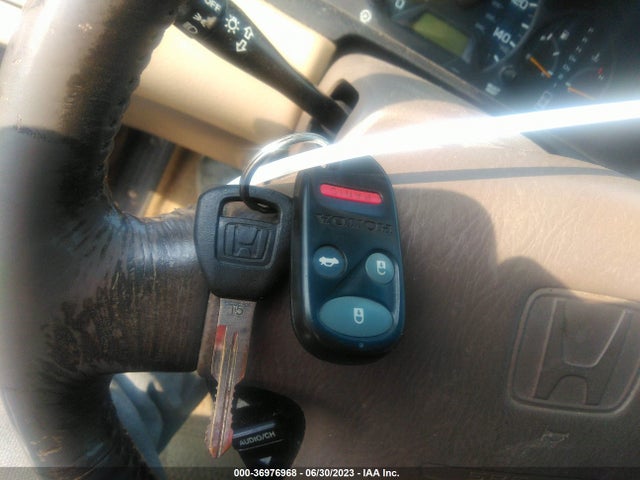 1999 HONDA ACCORD SDN EX VIN: 1HGCG1654XA054084