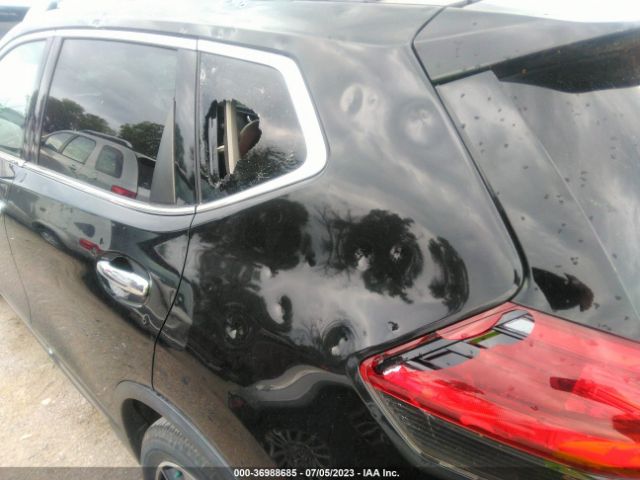 JN8AT2MV5JW342057 Nissan Rogue Sl