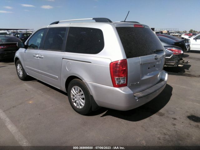 KNDMG4C79E6585209 KIA SEDONA LX