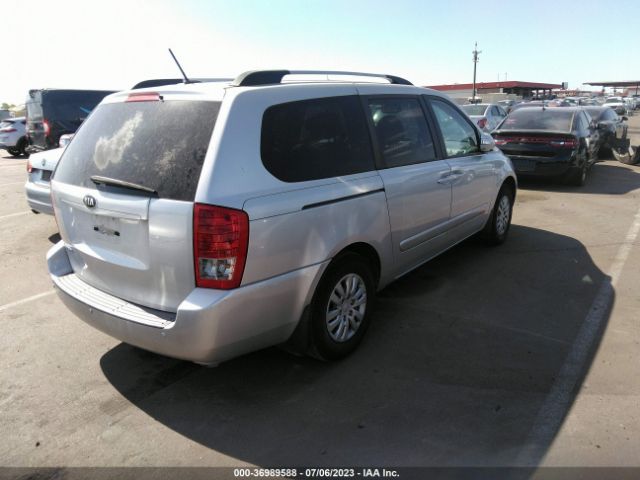 KNDMG4C79E6585209 KIA SEDONA LX
