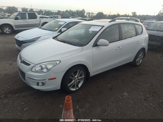 2010 HYUNDAI ELANTRA TOURING SE VIN: KMHDC8AE2AU068095