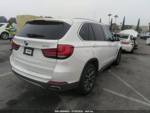 5UXKR2C50J0X07990 BMW X5 Sdrive35i