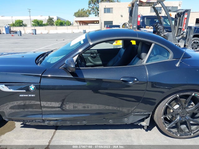 2014 BMW Z4, VIN: WBALM7C59EE385812