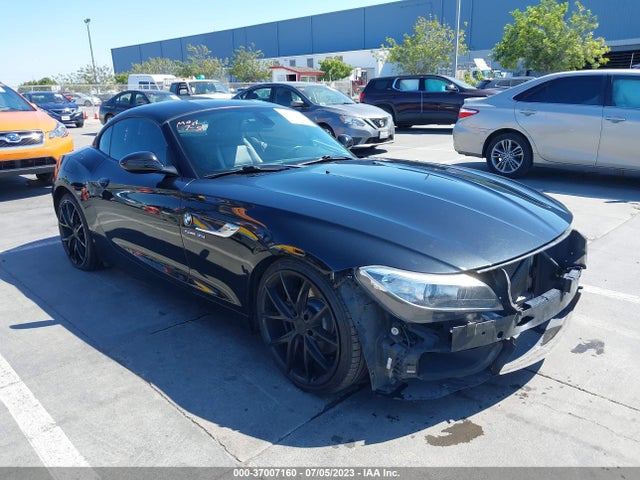 2014 BMW Z4, VIN: WBALM7C59EE385812