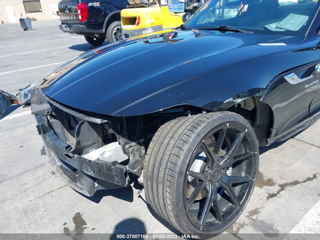 2014 BMW Z4, VIN: WBALM7C59EE385812