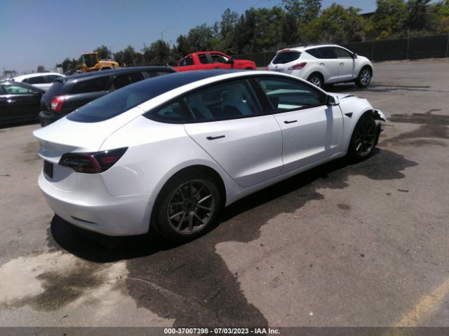 5YJ3E1EA4MF994309 Tesla Model 3 Standard Range Plus