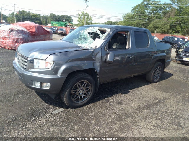 2013 HONDA RIDGELINE RTL VIN: 5FPYK1F51DB008645