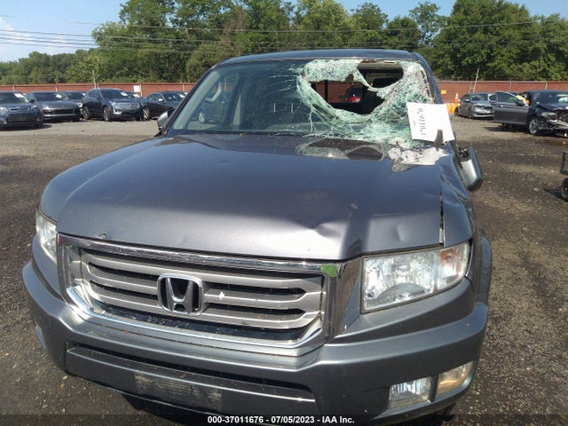 2013 HONDA RIDGELINE RTL VIN: 5FPYK1F51DB008645