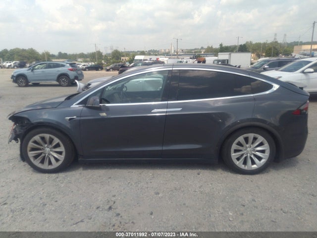 2021 Tesla Model X, VIN: 5YJXCDE20MF323060