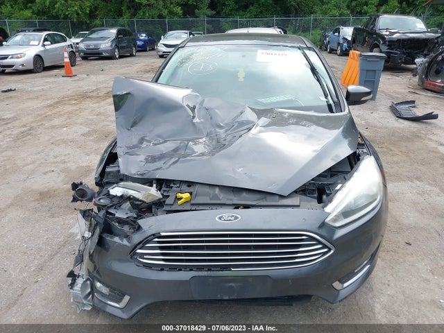 2016 FORD FOCUS TITANIUM VIN: 1FADP3J26GL343117