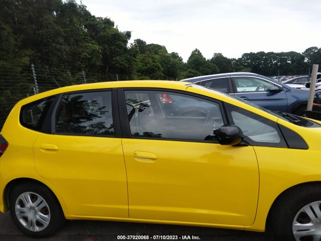 2009 HONDA FIT VIN: JHMGE88249S051053