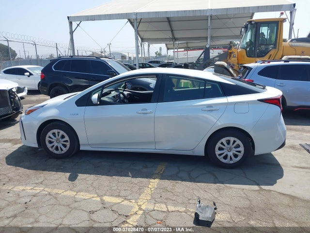 2021 TOYOTA PRIUS L VIN: JTDKAMFUXM3151004
