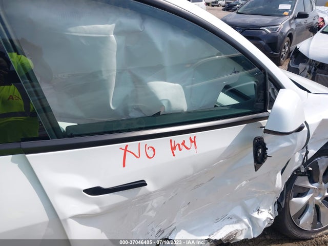 2023 TESLA MODEL Y LONG RANGE VIN: 7SAYGDEE4PA062393